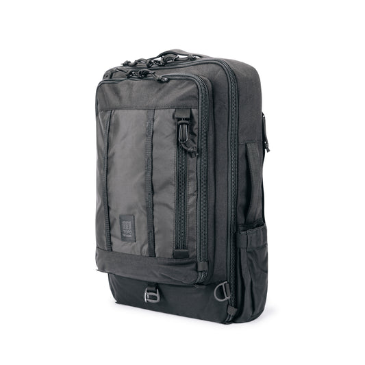 Topo Designs Global Travel Bag 30L Durable Carry On Convertible Laptop Travel Backpack in "Black / Black".