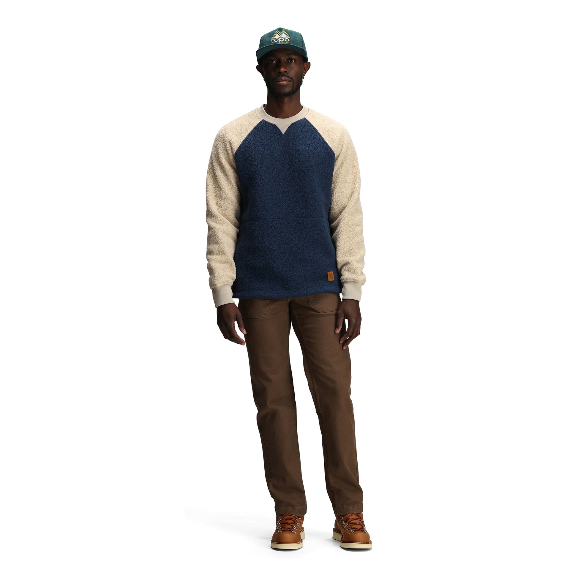 General front model shot of Topo Designs Mountain Fleece Crewneck - Unisex in "Midnight / Oatmeal"