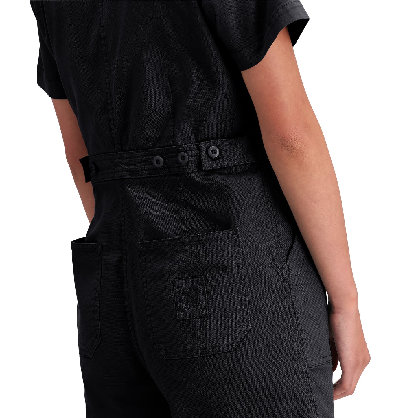 Detail shot of Topo Designs Dirt Romper - Women's in "Black"