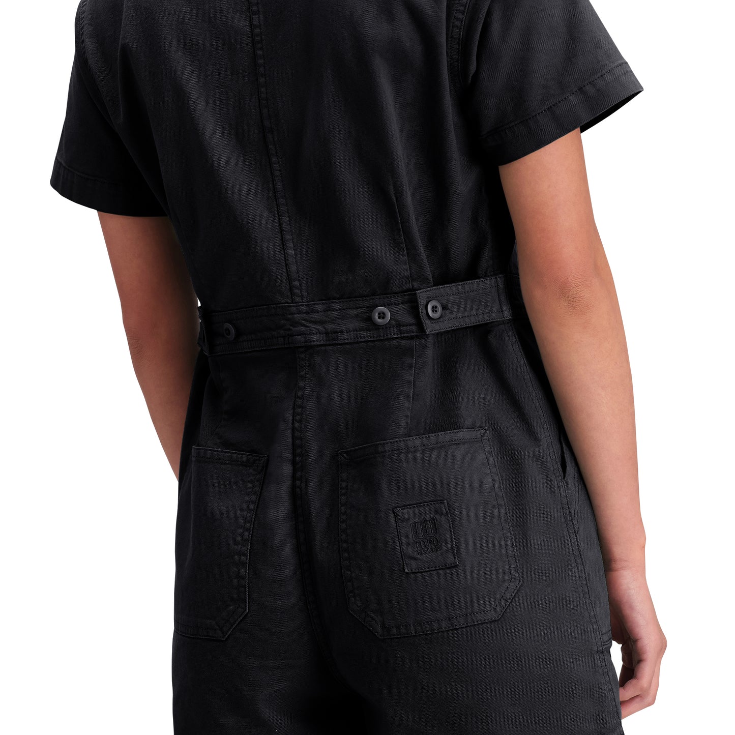 Detail shot of Topo Designs Dirt Romper - Women's in "Black"