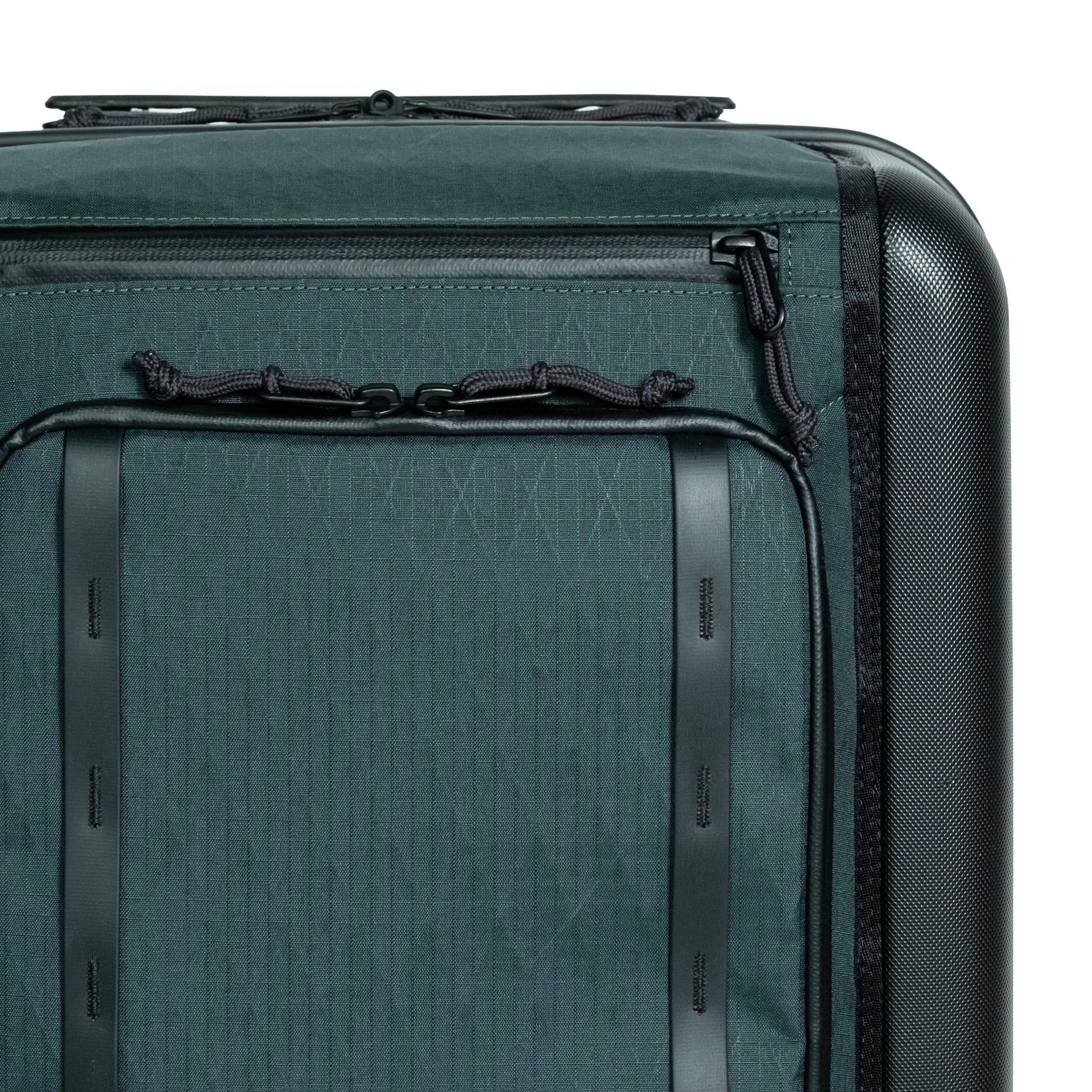 General front detail zipper shot of Topo Designs Global Pro Travel Roller Bag