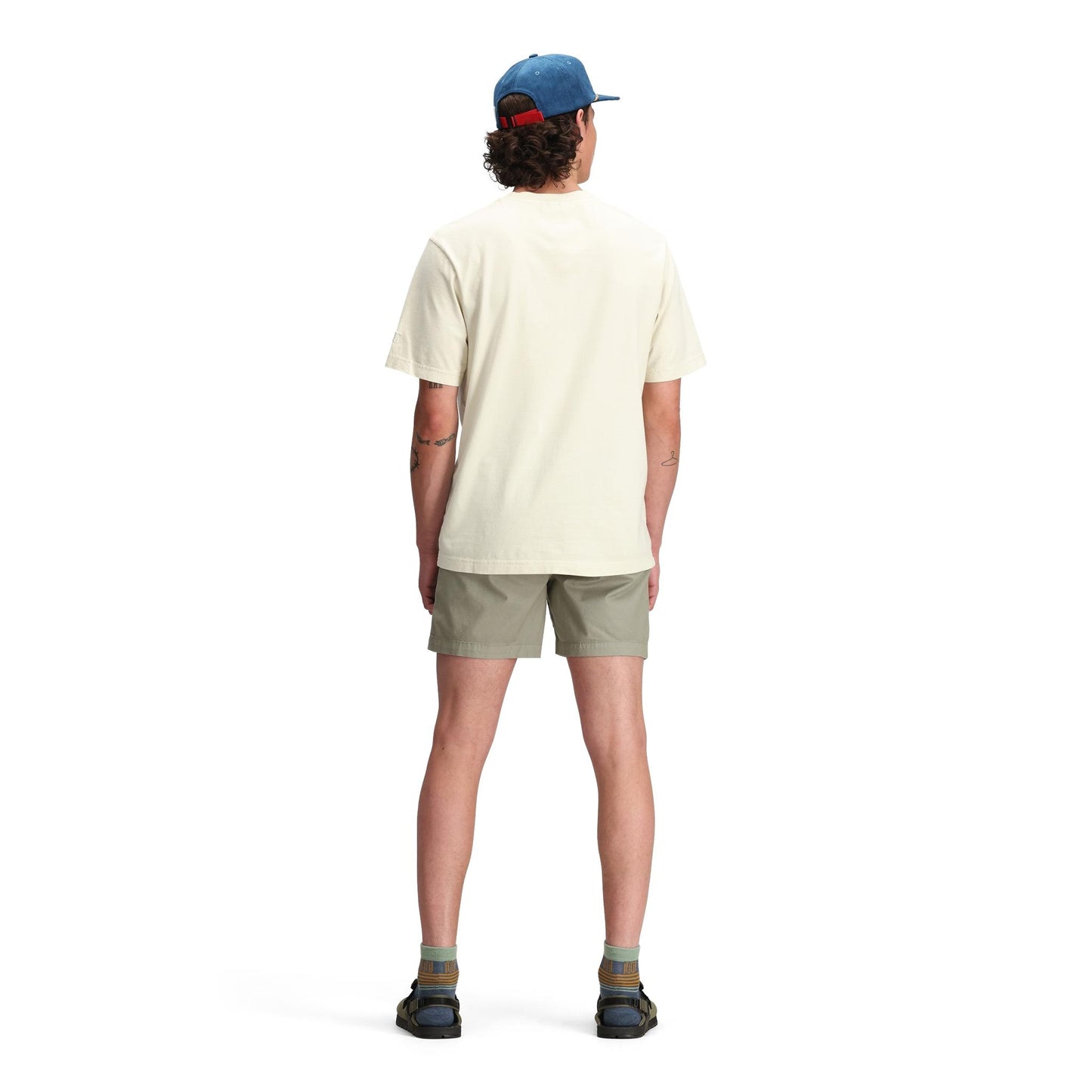 General back model shot of Topo Designs Dirt Henley Short Sleeve - Men's in "Bone White"